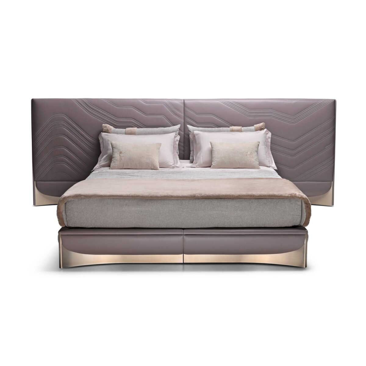 Exquisite Lumina White Leather Bed with white fabric headboard and rose gold hardware.