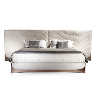 Exquisite Lumina White Leather Bed with white fabric headboard and rose gold hardware.