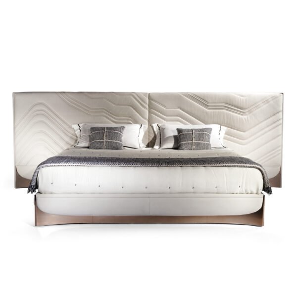 Exquisite Lumina White Leather Bed with white fabric headboard and rose gold hardware.