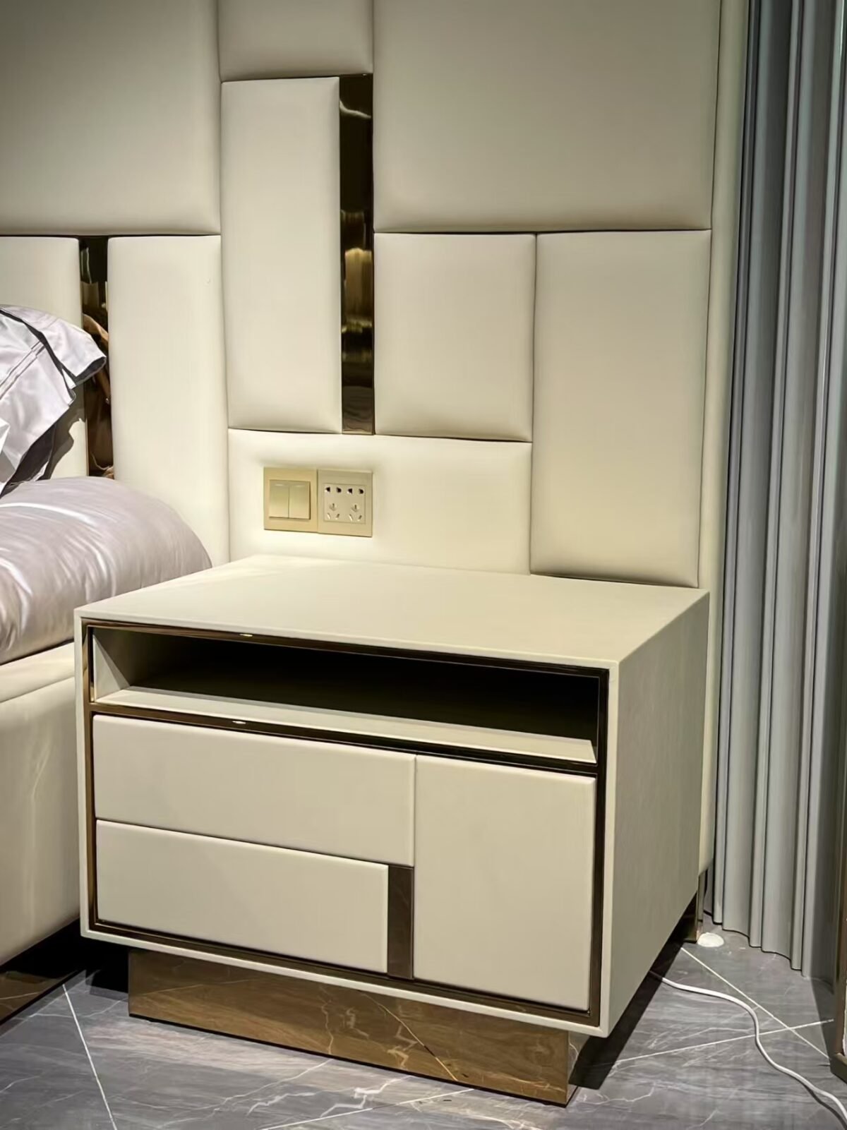 Babylon bedside table with LED lighting in upscale hotel suite with ambient glow