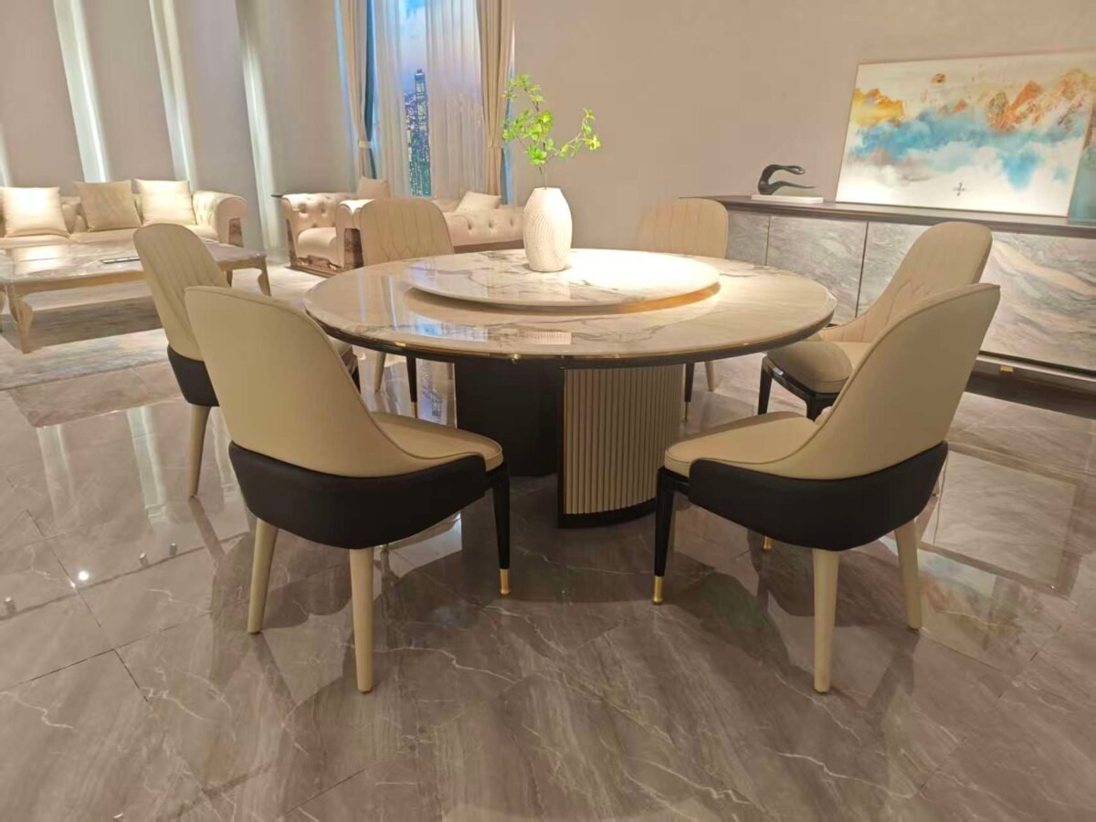 Round turntable dining table in contemporary restaurant with engineered stone dining furniture