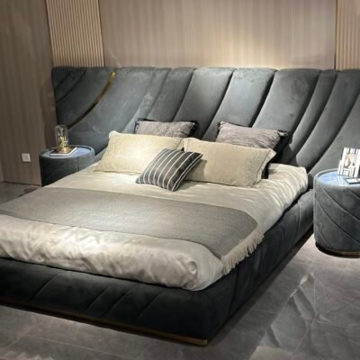 Metal headboard bed with customizable upholstery in modern bedroom setting