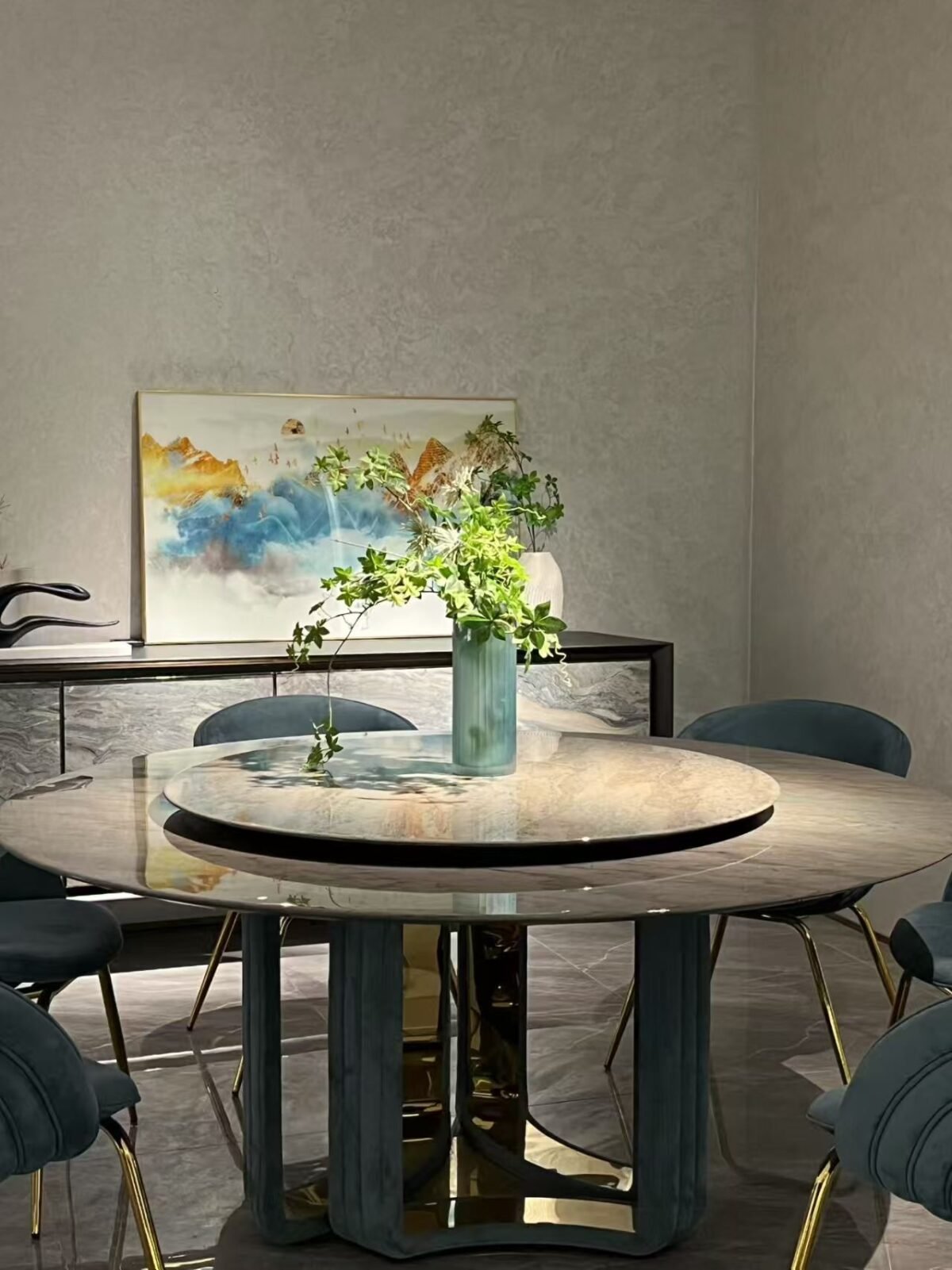 Premium round dining furniture in upscale restaurant with guests using rotating turntable feature