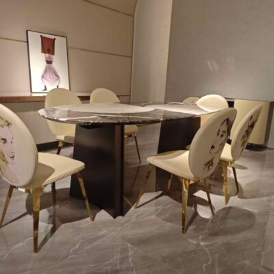 Commercial grade restaurant table in upscale dining room with guests seated at mosaic stone surface