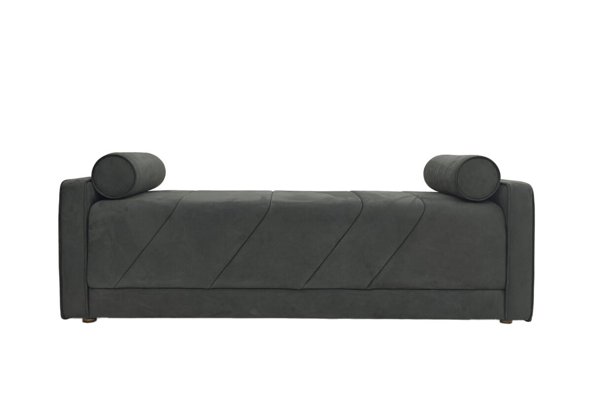 Bedend stool with bolster pillows featuring charcoal gray upholstery and diagonal stitching