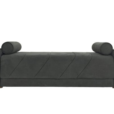 Bedend stool with bolster pillows featuring charcoal gray upholstery and diagonal stitching