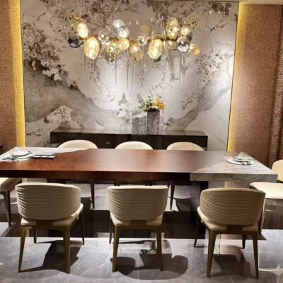 Large format dining table in contemporary restaurant setting with commercial dining table stone