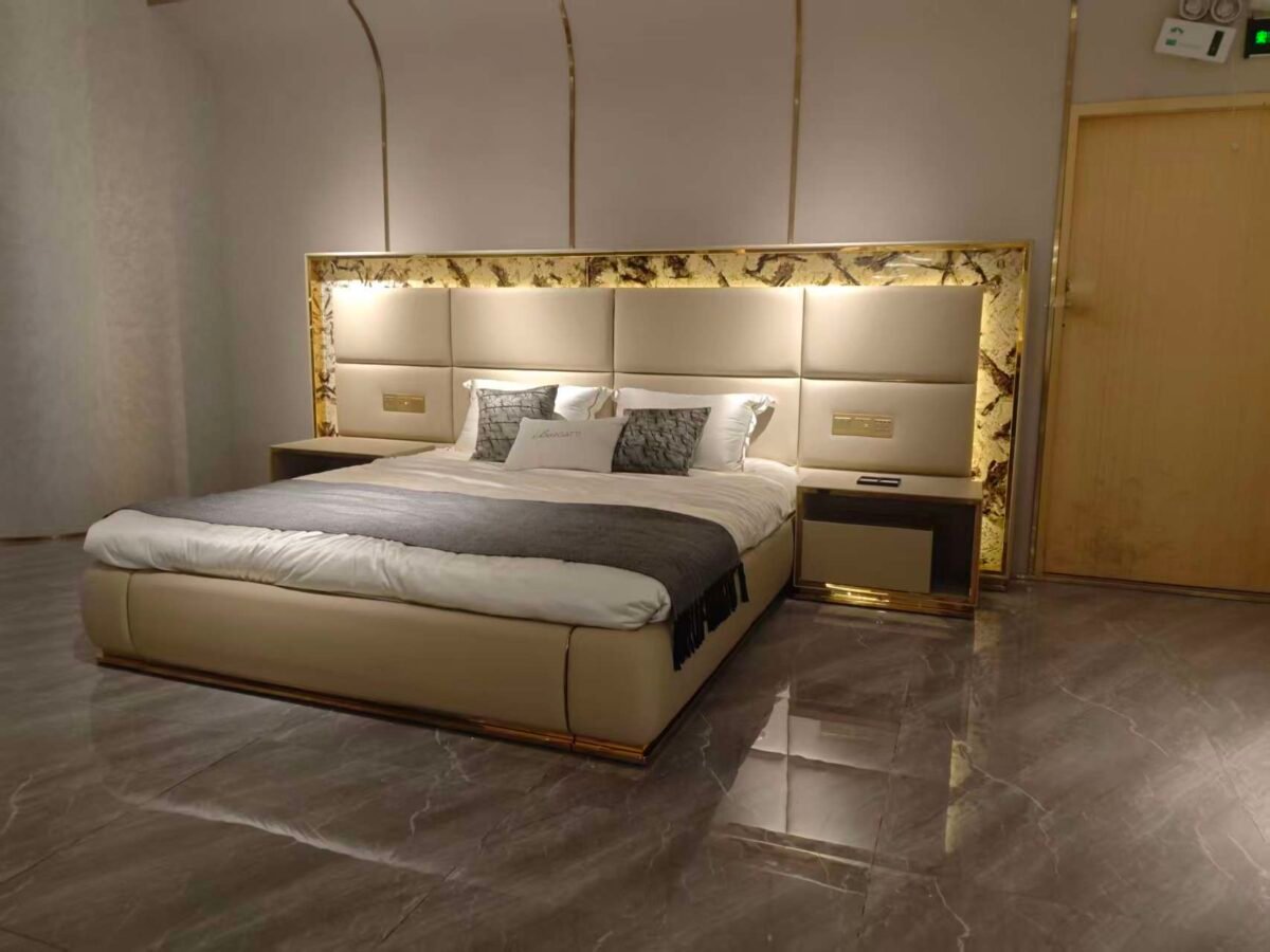 Luxury bed with gold headboard and smart lighting in modern bedroom with matching nightstand