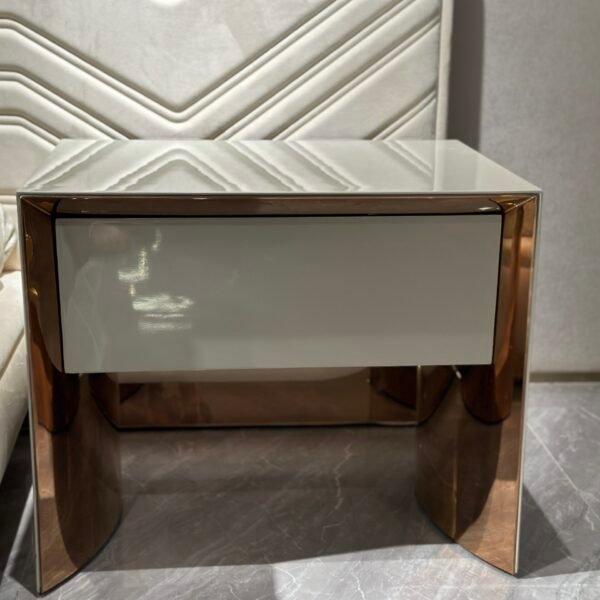 Rose gold nightstand hardware close-up showing luxury drawer handle and mirror finish detail
