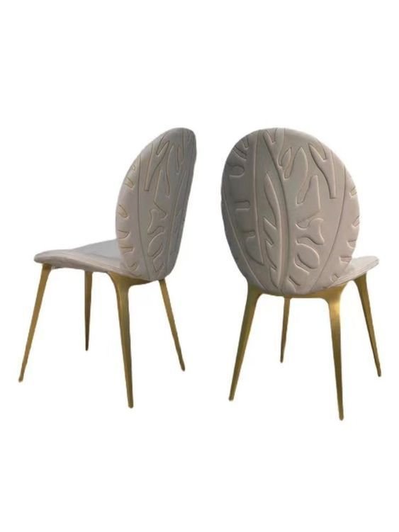 White dining chair with gold legs luxury upholstered brushed metal contemporary design hospitality