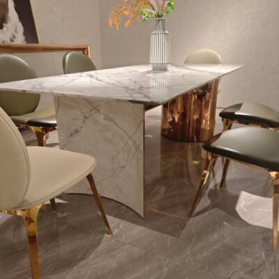 Luxury white marble table detail showing Cold River Snow veining pattern and gold hardware close-up