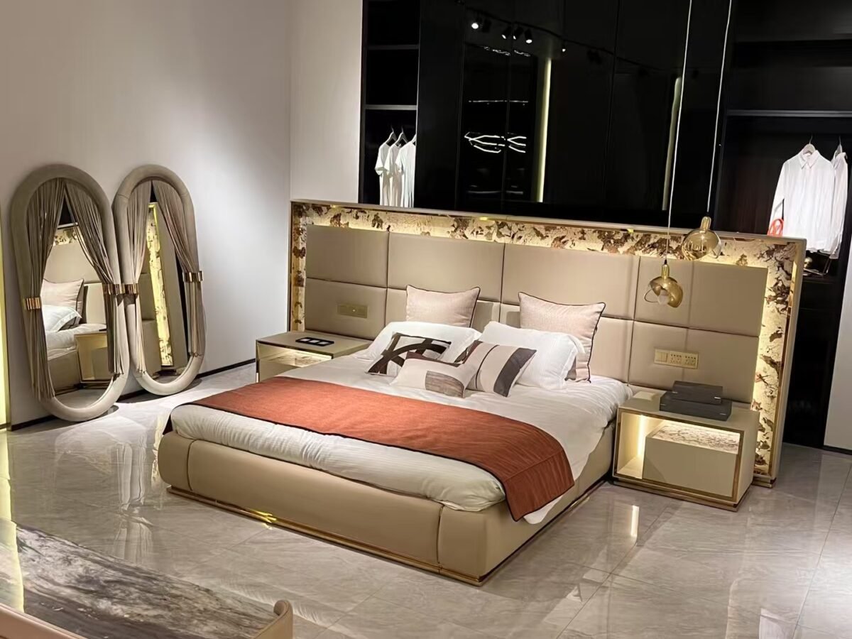 Luxury bed with gold headboard and smart lighting in modern bedroom with matching nightstand