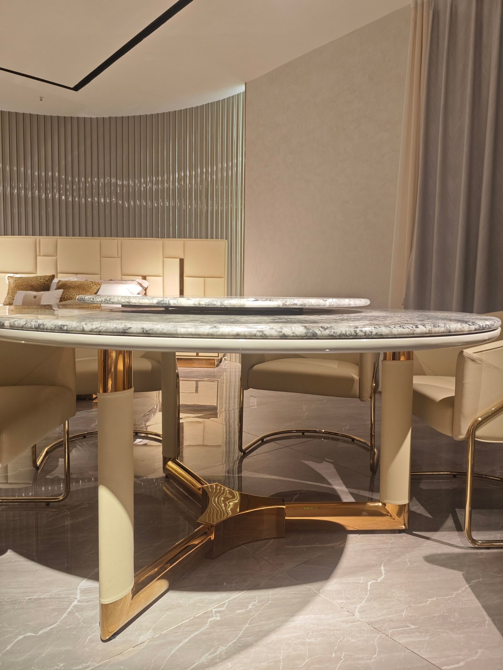 Dual marble dining furniture detail showing Elephant White and Versace Black marble contrast close-up