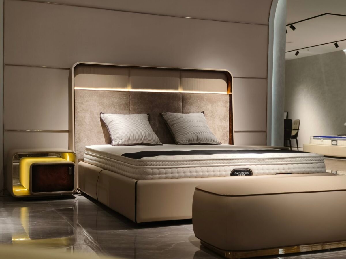 Luxury bedside cabinet design in upscale bedroom setting with ambient LED glow