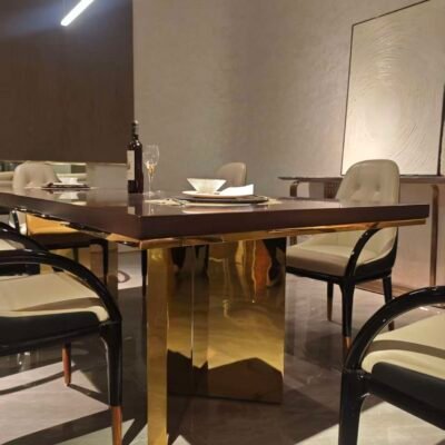 Inlay wood dining furniture detail showing geometric pattern craftsmanship and glossy finish close-up