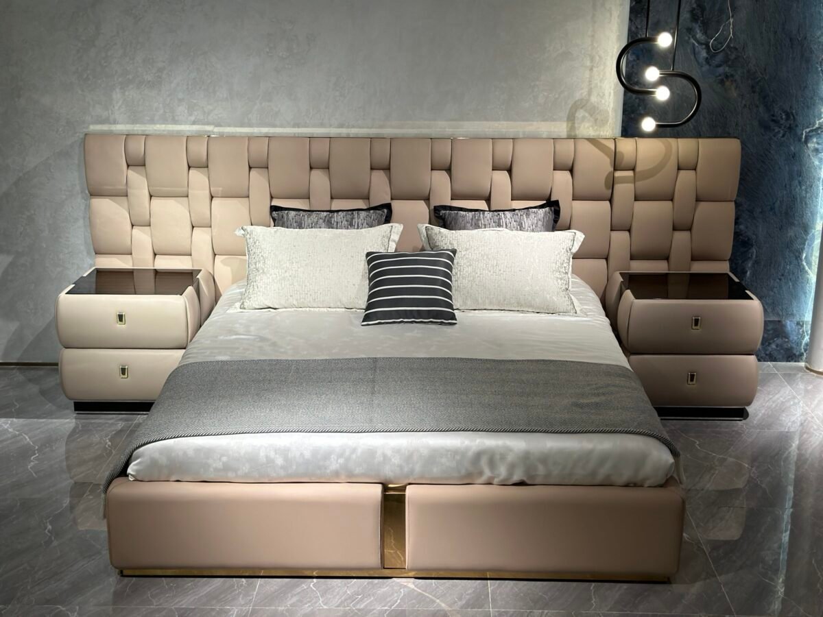 Cantor Dual Bed with faux leather headboard and matching nightstand in modern bedroom