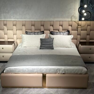 Cantor Dual Bed with faux leather headboard and matching nightstand in modern bedroom