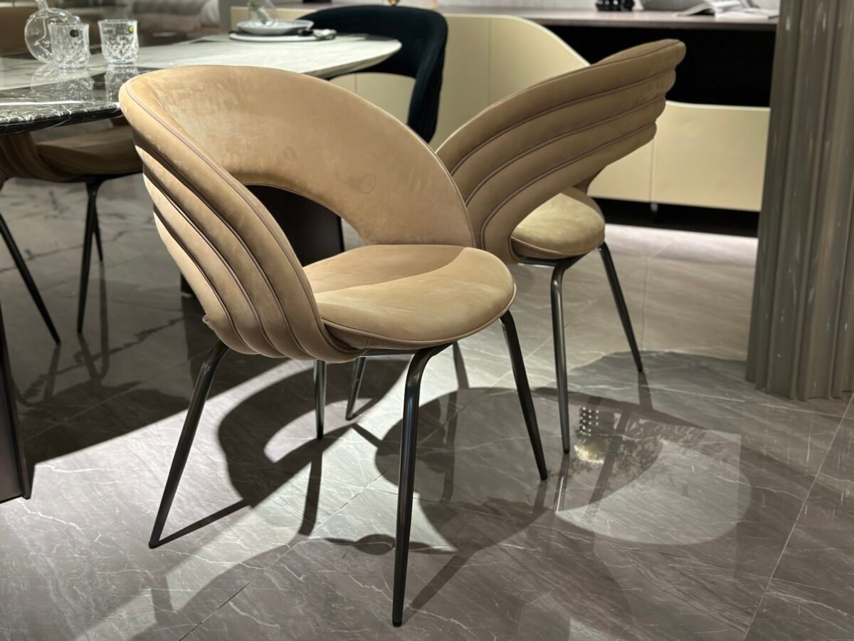 Commercial dining chair upholstery shown from multiple angles displaying curved ergonomic design specifications