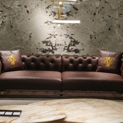 Executive living room sofa collection in brown leather styled in luxury private residence lounge