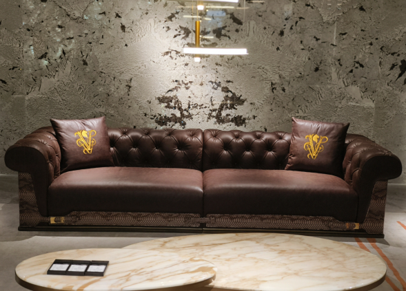 Executive living room sofa collection in brown leather styled in luxury private residence lounge