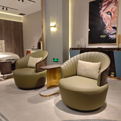 Blue leather armchair boutique hotel suite bedroom luxury furniture hospitality interior designer seating contemporary residential executive