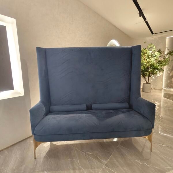 High back velvet armchair boutique hotel lobby interior luxury statement furniture hospitality design blue gold contemporary spac