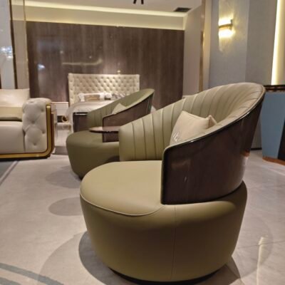 Matte genuine leather close up texture blue armchair grain pattern black pearl wood veneer base detail commercial hospitality furniture