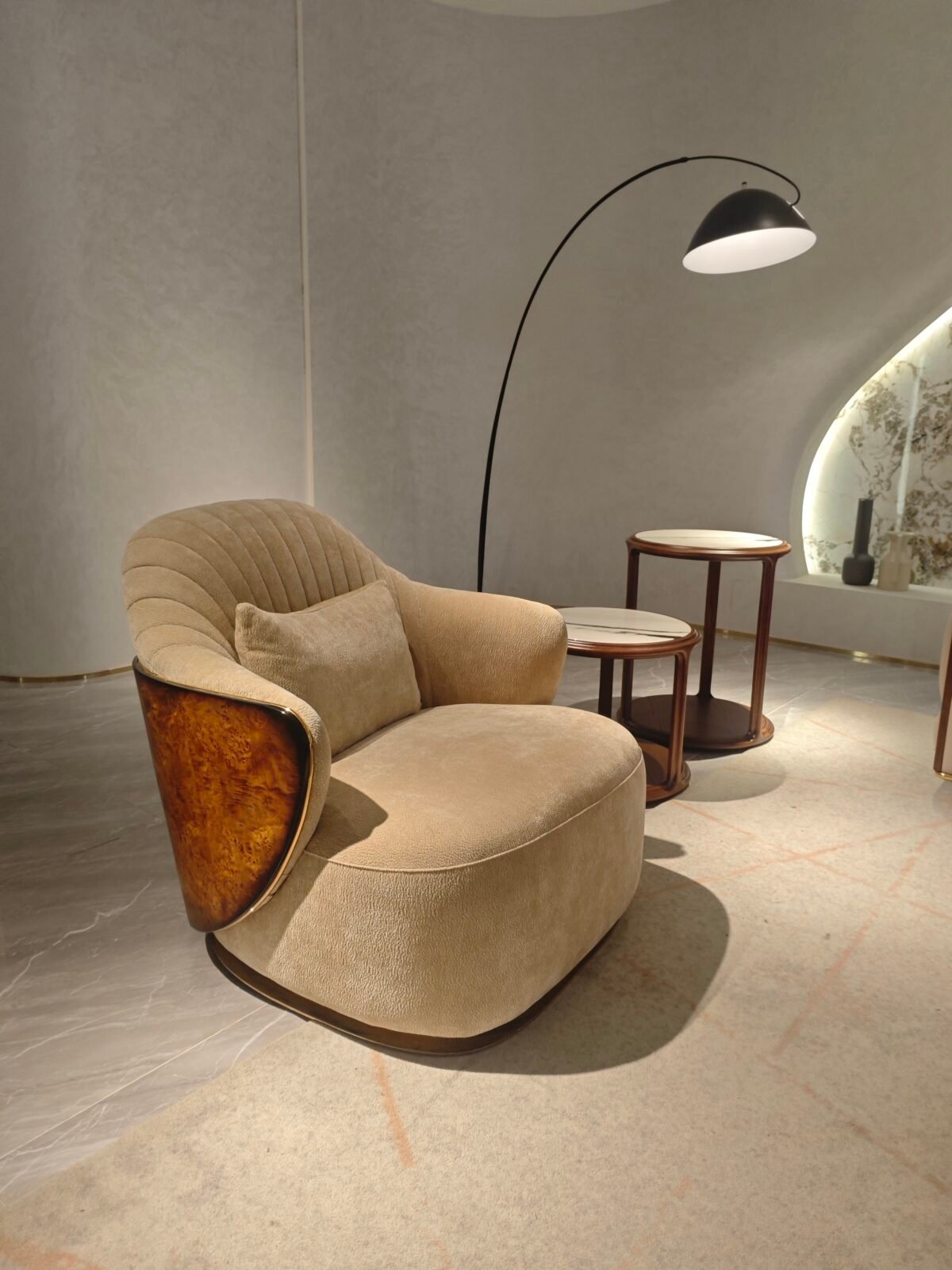 Beige leather lounge chair multiple angles views embroidered back dimensions specification commercial hospitality furniture contract neutral