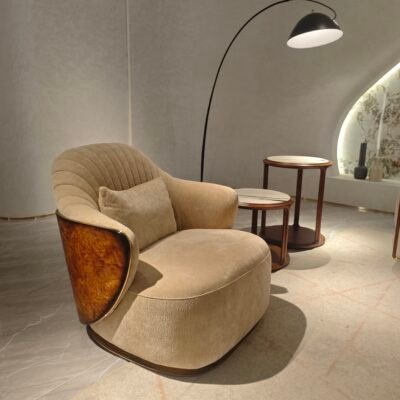 Beige leather lounge chair multiple angles views embroidered back dimensions specification commercial hospitality furniture contract neutral