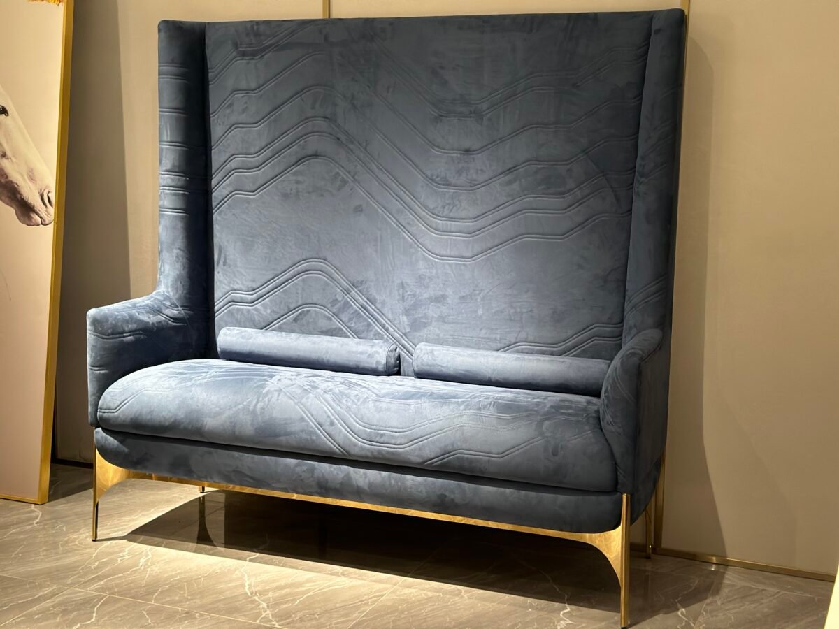 Blue velvet upholstery close up texture gold metal leg detail high back chair commercial hospitality furniture craftsmanship quality