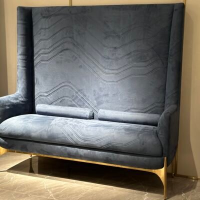 Blue velvet upholstery close up texture gold metal leg detail high back chair commercial hospitality furniture craftsmanship quality