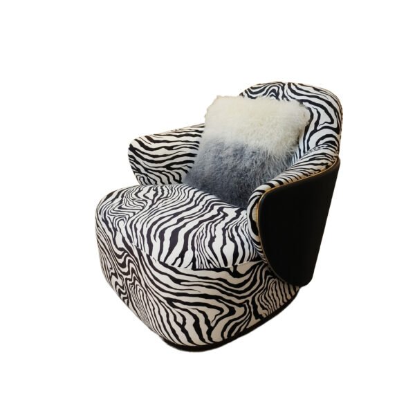 Zebra print lounge chair statement accent hospitality furniture bold pattern luxury commercial design boutique hotel restaurant chair