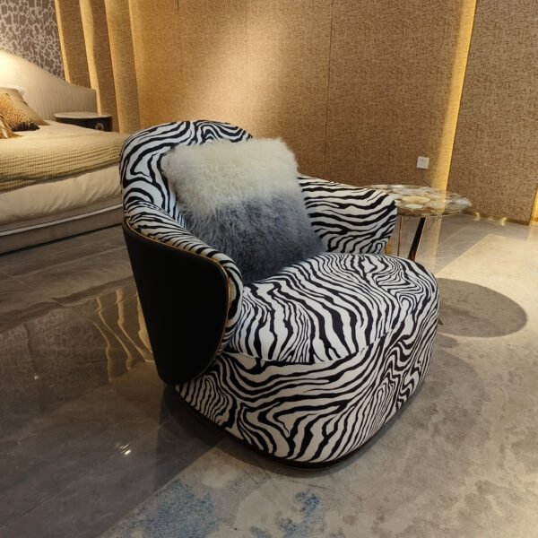 Zebra print lounge chair boutique hotel lobby interior statement furniture bold pattern hospitality design eclectic contemporary social media