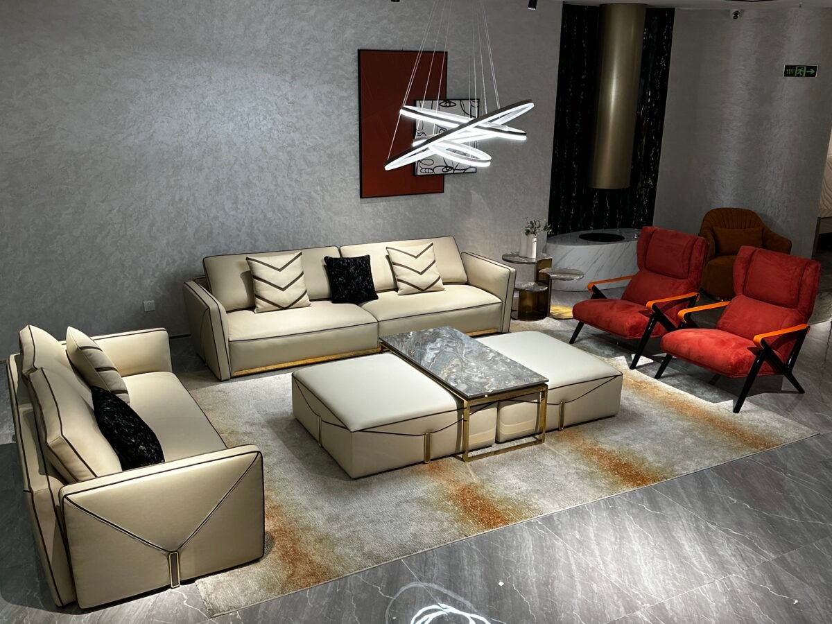 Contemporary home seating furniture – genuine leather luxury sofa in modern styled living room setting