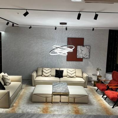 Contemporary home seating furniture – genuine leather luxury sofa in modern styled living room setting