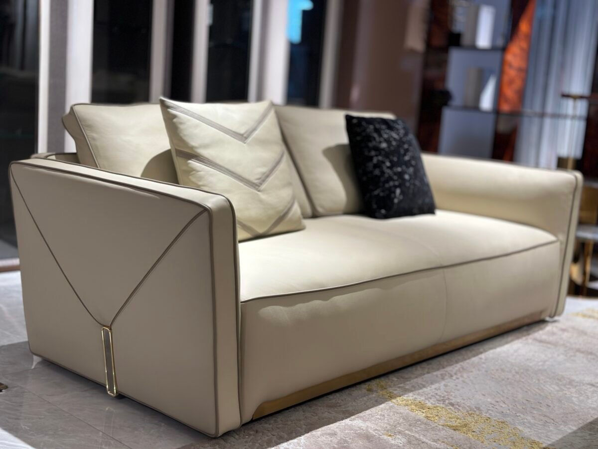 Close-up white leather sofa set texture showing genuine semi-leather upholstery and plush cushion detail