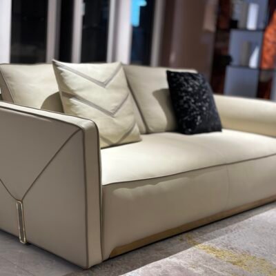 Close-up white leather sofa set texture showing genuine semi-leather upholstery and plush cushion detail