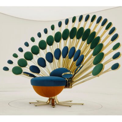 Peacock chair decorative furniture boutique hotel lobby interior blue gold bohemian luxury hospitality design eclectic contemporary social media