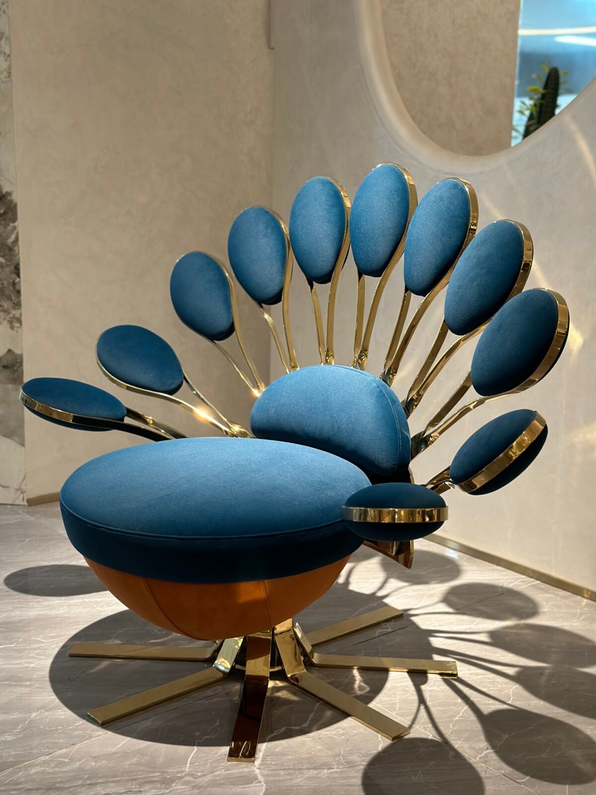 Blue gold fabric close up texture peacock chair detail decorative upholstery hardware gold leg finish commercial hospitality furniture