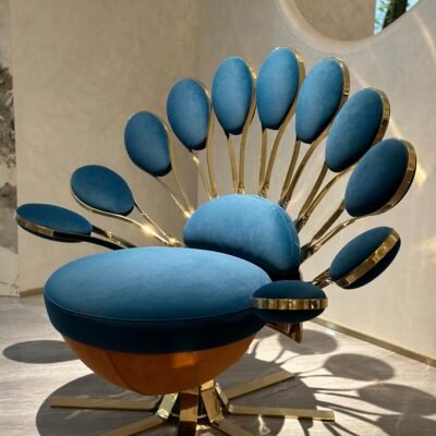 Blue gold fabric close up texture peacock chair detail decorative upholstery hardware gold leg finish commercial hospitality furniture