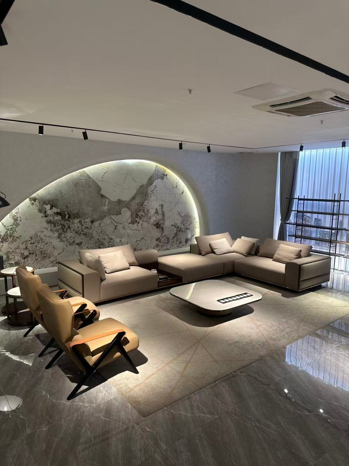 Four piece beige sectional living room set styled in contemporary open plan luxury residence