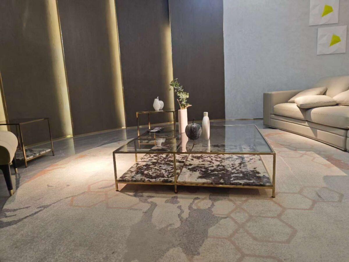 Custom stone top coffee table frame with gray glass and brown copper hardware base