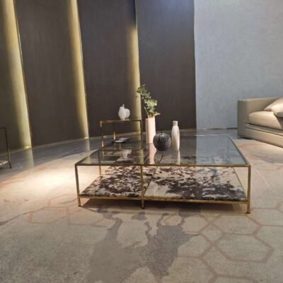 Custom stone top coffee table frame with gray glass and brown copper hardware base