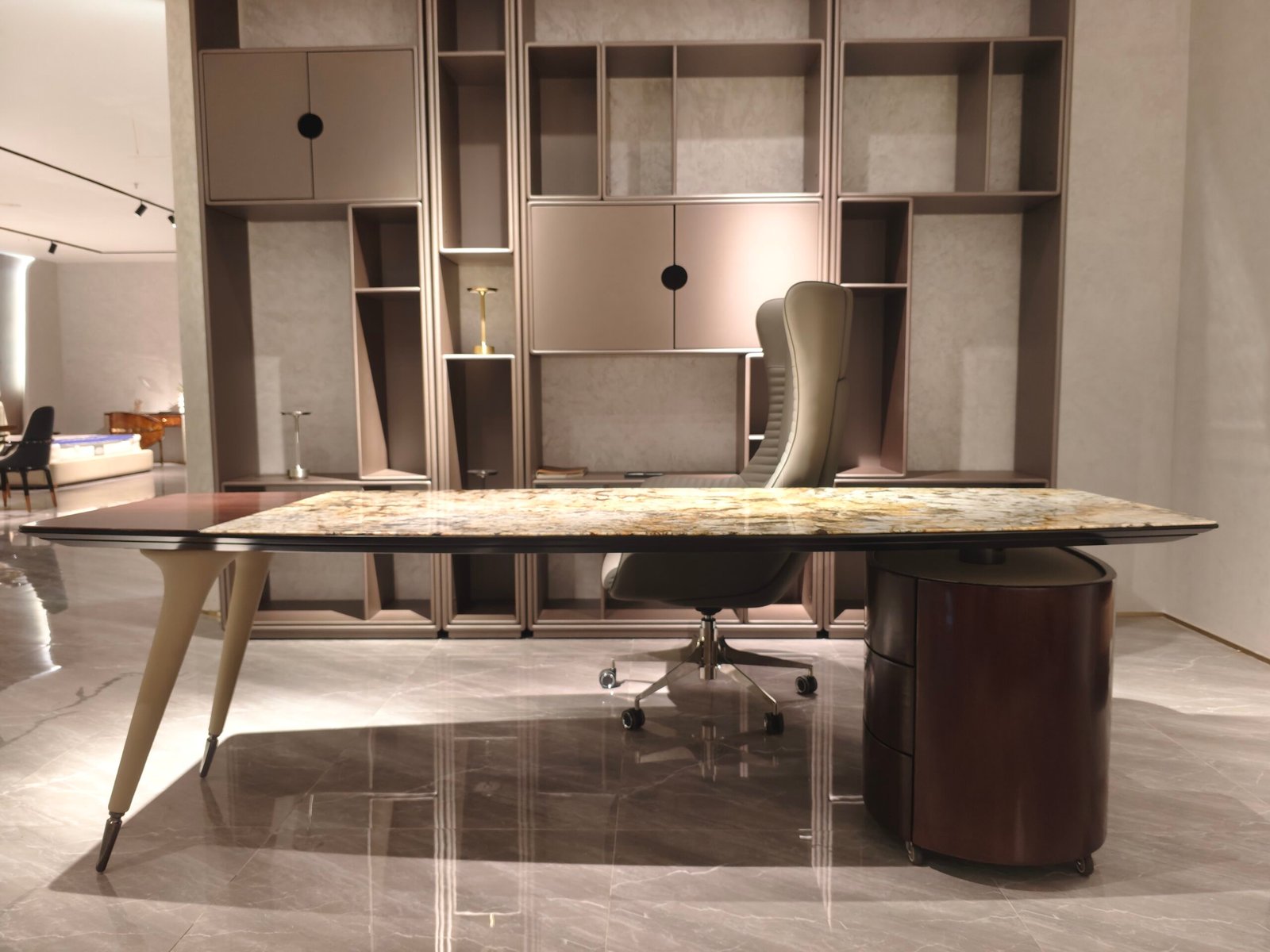 Contemporary stone desk home office corporate styled modern residential professional interior Ambassador butterfly gold wood veneer