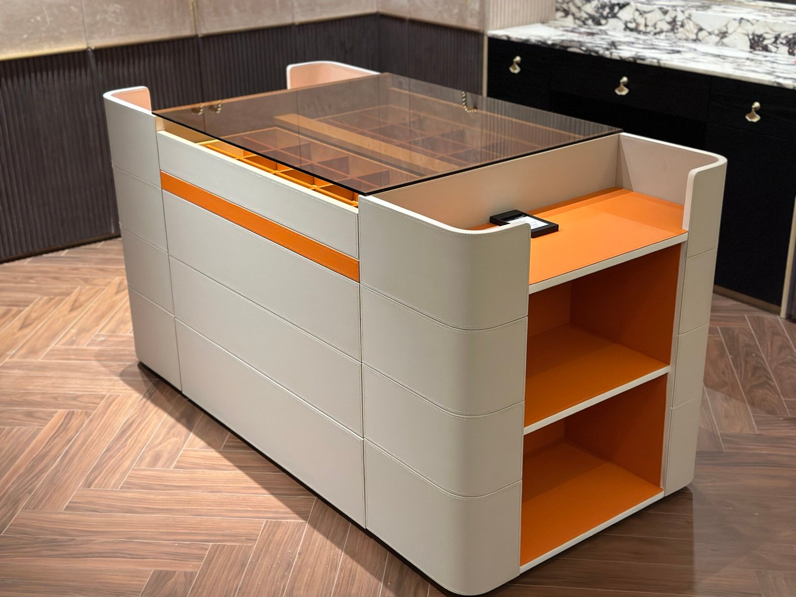 Orange glass display cabinet saddle leather accent orange white exterior finish glass front transition detail