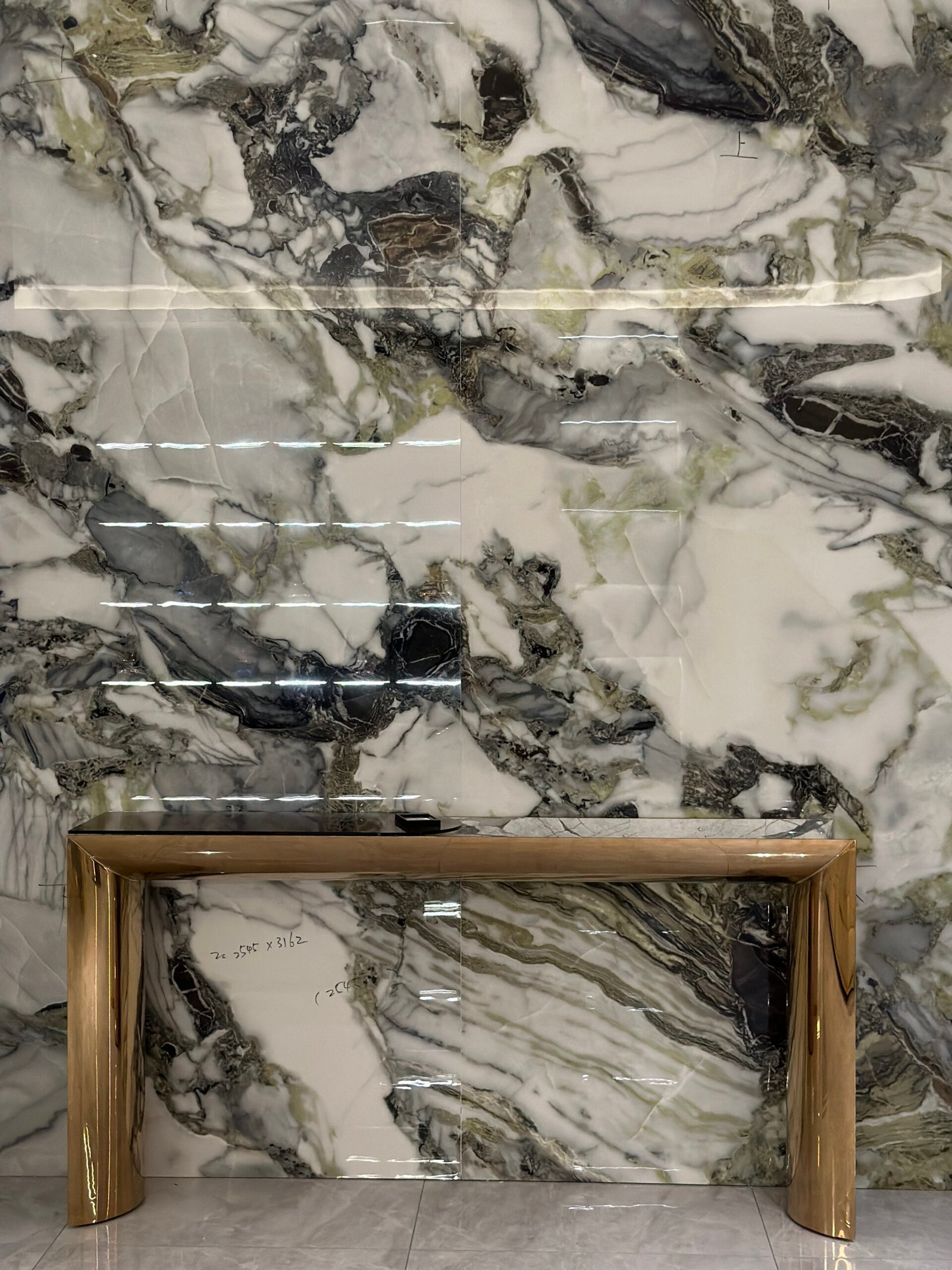 Contemporary marble console table for entrance hall styled modern residential hallway interior Prussian copper mirror snow accent 180cm