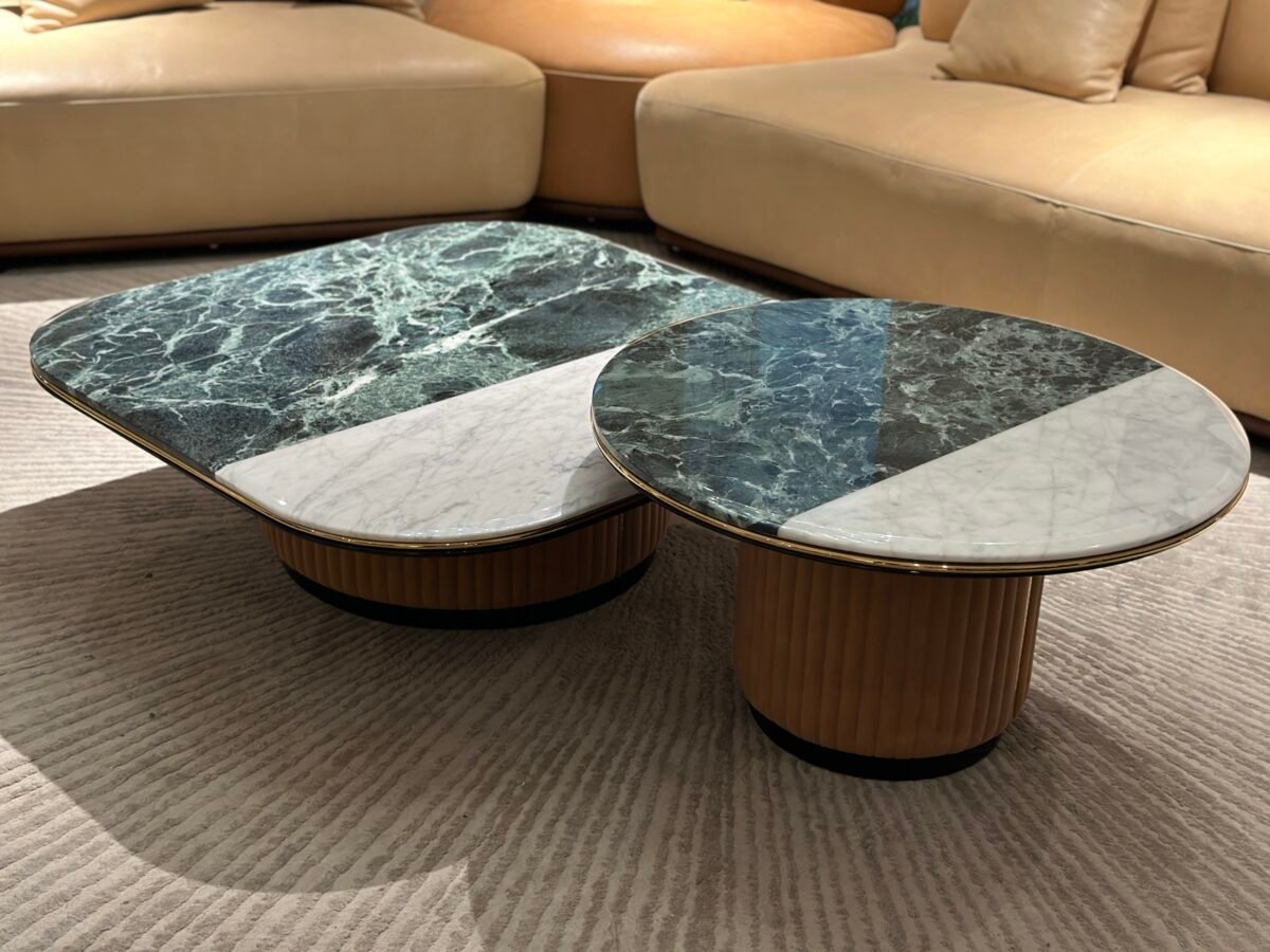 Premium glass corner table with stone top styled in contemporary luxury living room interior