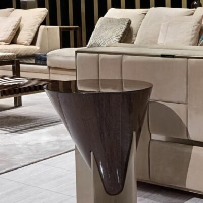 Contemporary wood accent table for living room bedroom styled in modern residential interior eucalyptus bronze gold