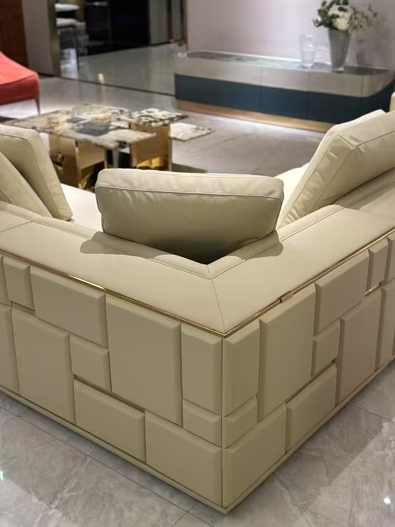 Close-up suede genuine leather upholstery surface and built-in storage compartment open detail