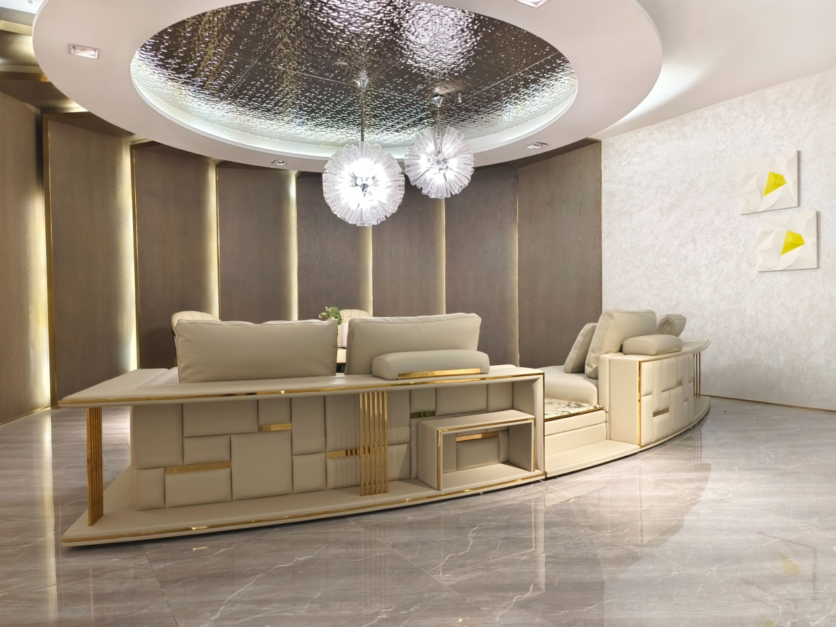 Semi leather curved living room sofa hardware construction and plush cushion detail view